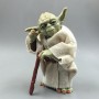 Figurine Jedi Yoda sabre laser